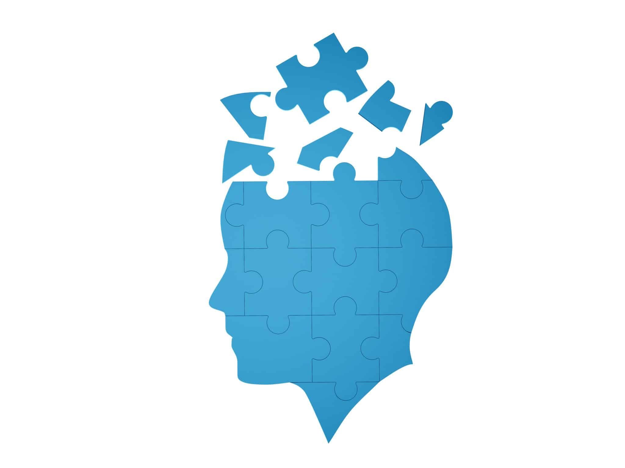 Blue jigsaw puzzle as a human brain on white background in medical concept for Alzheimer's disease. 3d abstract illustration